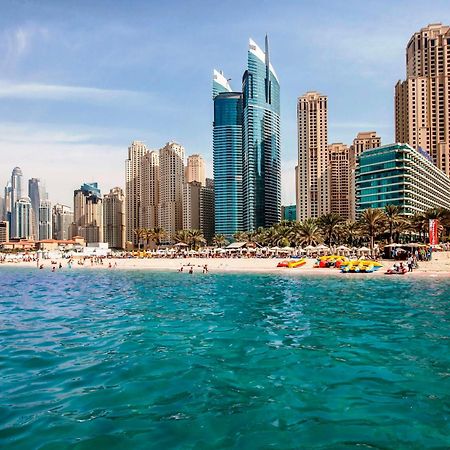 Hilton Dubai Jumeirah Exterior foto Dubai Marina skyline