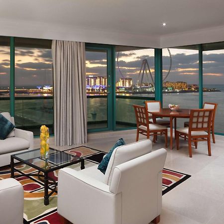 Hilton Dubai Jumeirah Exterior foto Marina Bay Suites