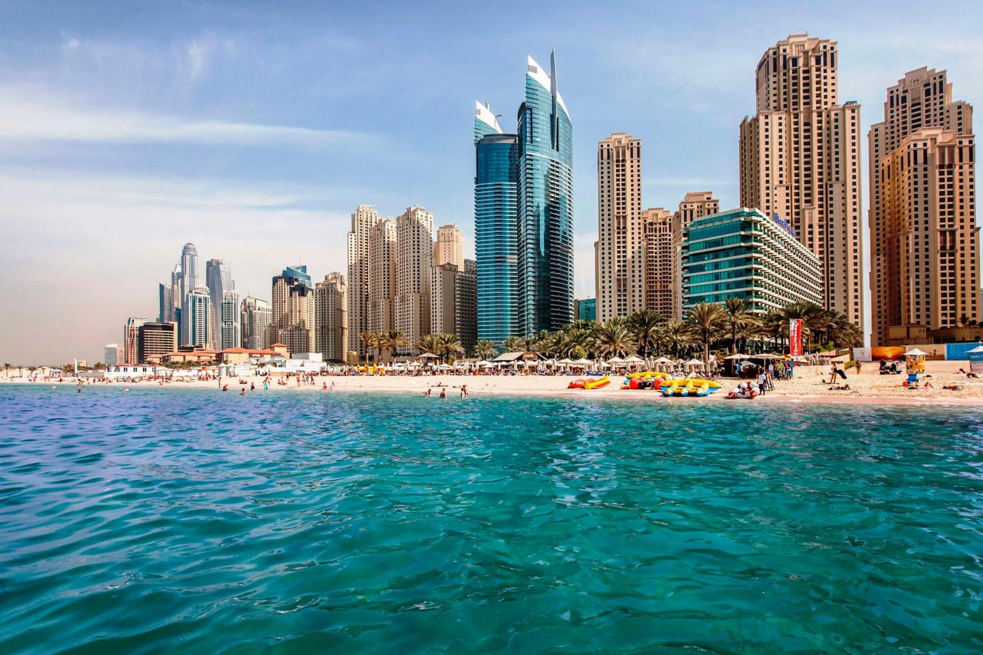 Hilton Dubai Jumeirah Exterior foto Dubai Marina skyline